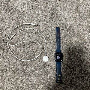 Apple Blue Smartwatch with White Charger